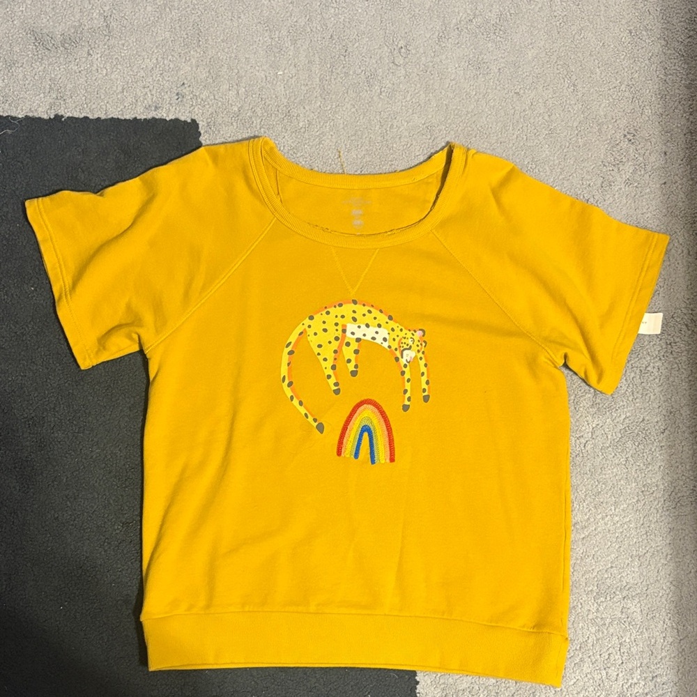 Anthropologie Graphic Yellow Short Sleeved Shirt with Rainbow and Leopard Design
